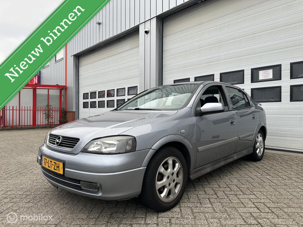 Opel Astra - 1.6 8V Njoy/Automaat/Airco/Cruise/LM Velgen/APK - AutoWereld.nl