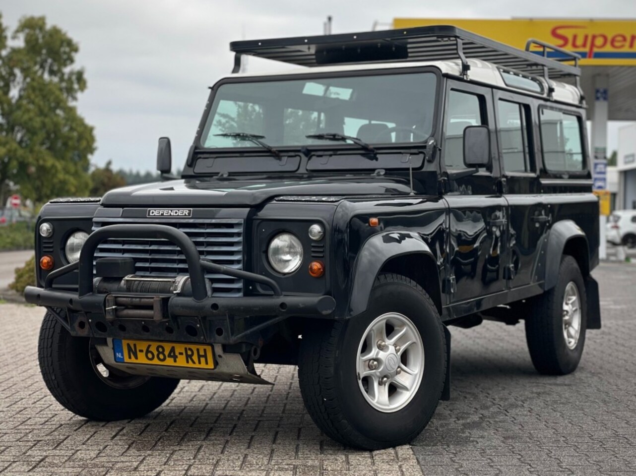 Land Rover Defender 110 - 2.5 TD5 110 SW G4 9-persoons - AutoWereld.nl