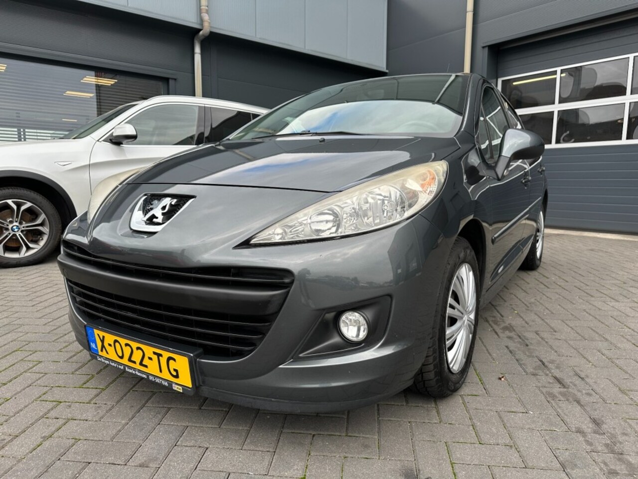 Peugeot 207 - 1.4 Acces Lite 5drs met airco, cruise control - AutoWereld.nl