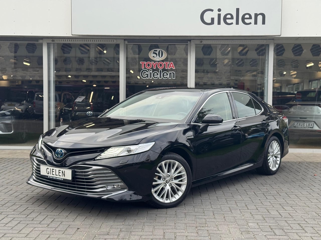Toyota Camry - 2.5 Hybrid Executive | Leer, Stoelverwarming, Elektrische achterklep, Dodehoekherkenning, - AutoWereld.nl