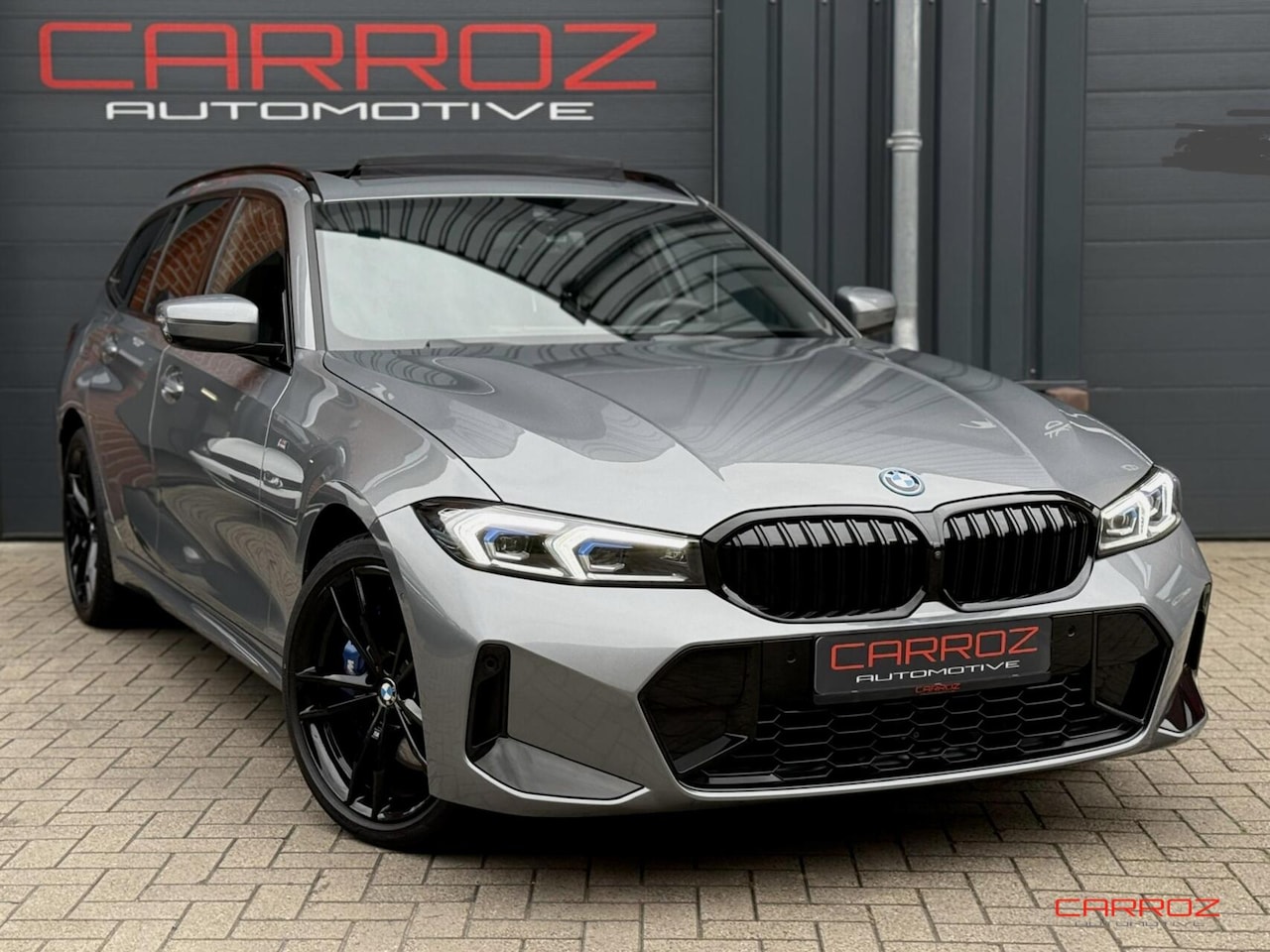 BMW 3-serie Touring - 330e Pano 360 H&K HuD Trekhaak Memory Ambiance - AutoWereld.nl