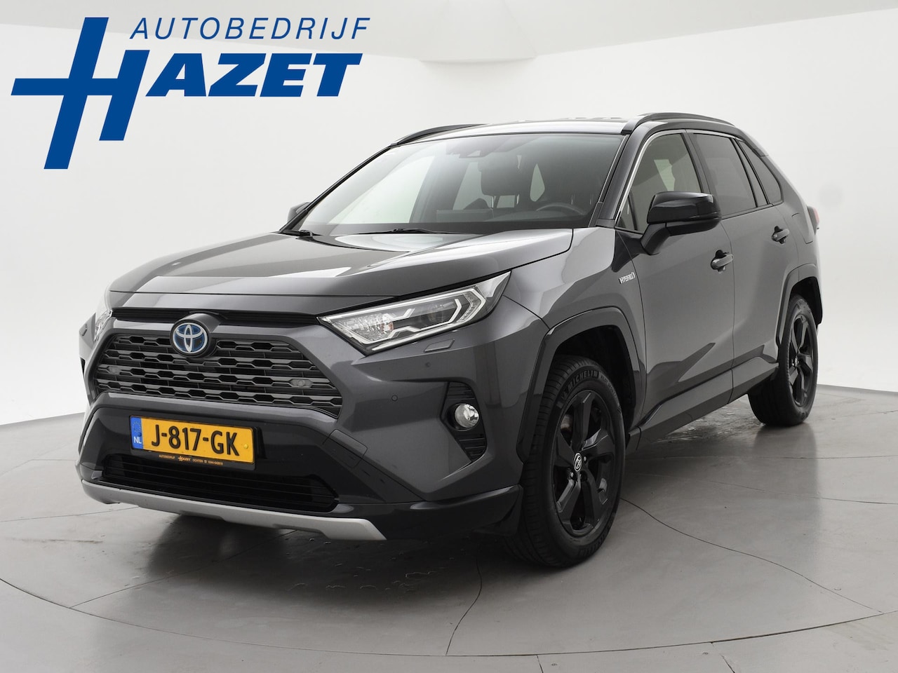 Toyota RAV4 - 2.5 HYBRID AWD BI-TONE + TREKHAAK | CARPLAY | CAMERA | STUUR/STOELVERWARMING - AutoWereld.nl