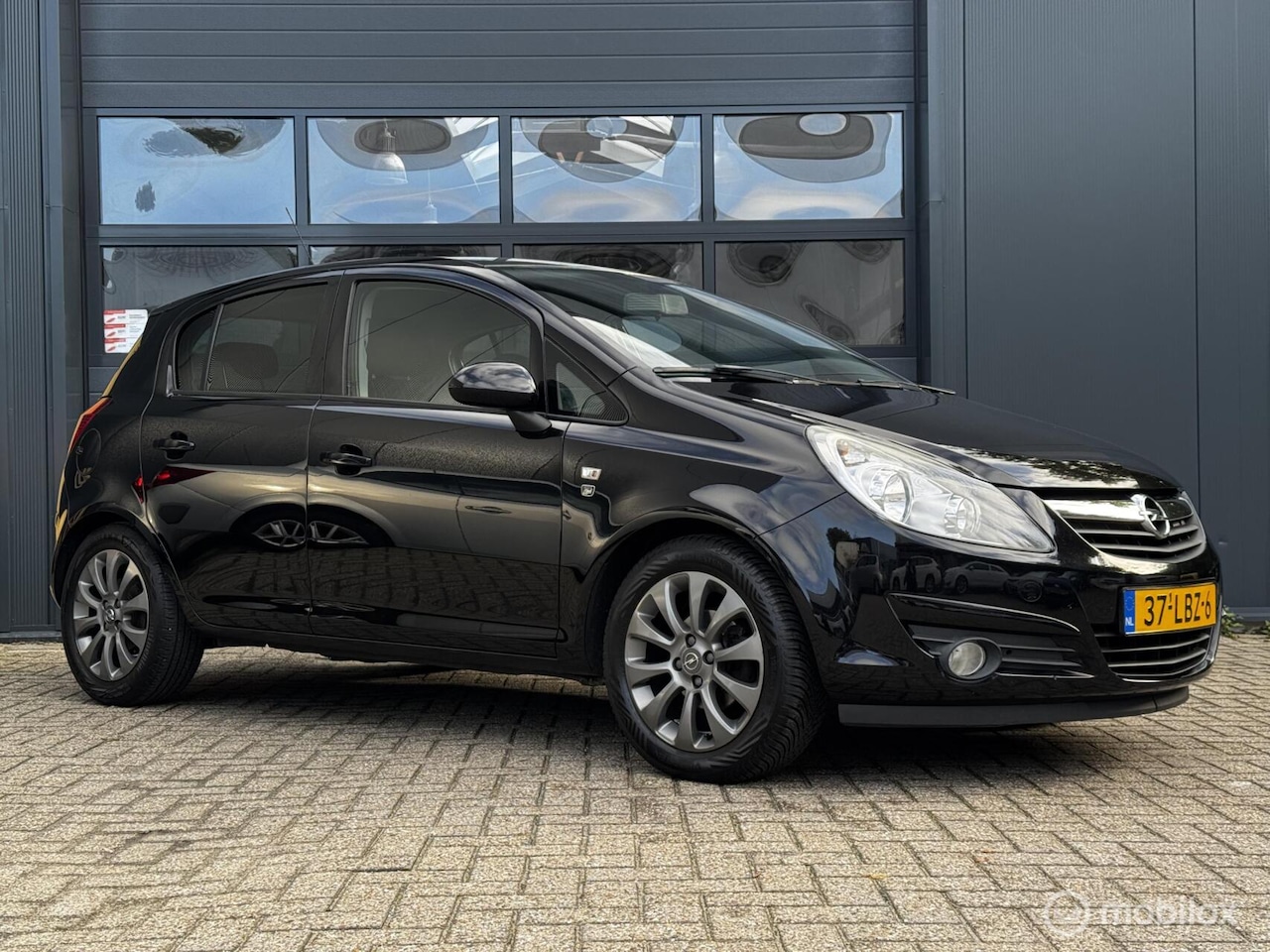 Opel Corsa - 1.2-16V Cosmo 1.2-16V Cosmo, Dealer Odh, Airco, trekhaak, 5deur - AutoWereld.nl