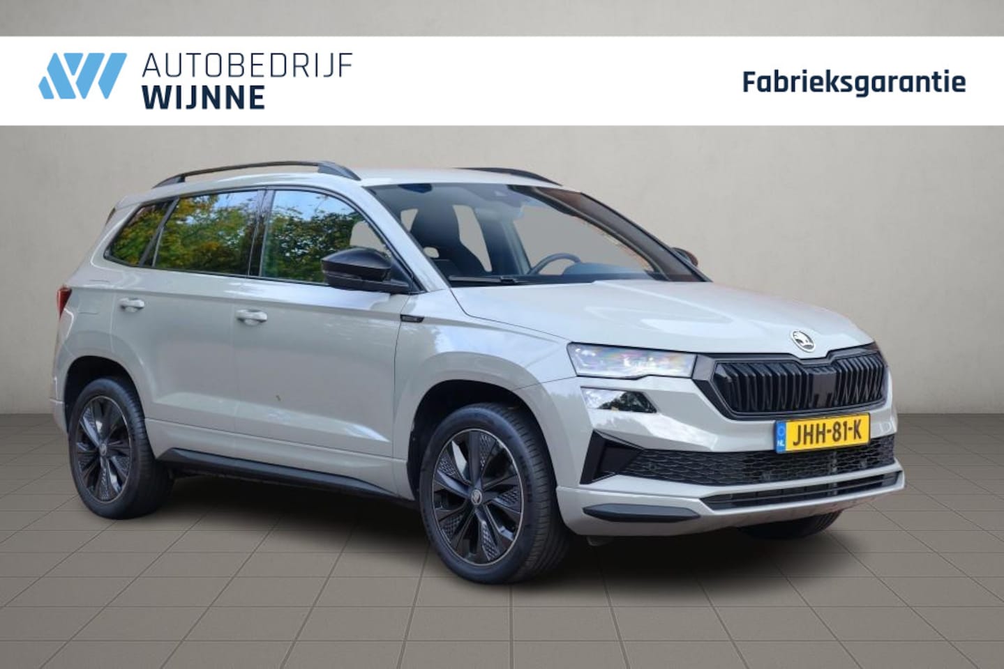 Skoda Karoq - 1.5 TSi 150pk DSG Sportline | Navi | App Connect | Climate | Adaptive Cruise | Camera | Ma - AutoWereld.nl