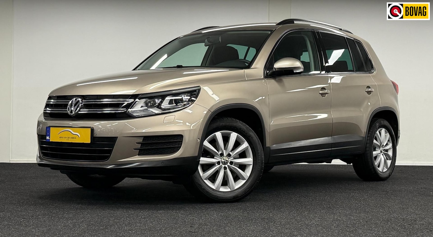 Volkswagen Tiguan - 1.4 TSI Comfort&Design Edition*Navi*Xenon*Stoelverw*CruiseControl - AutoWereld.nl