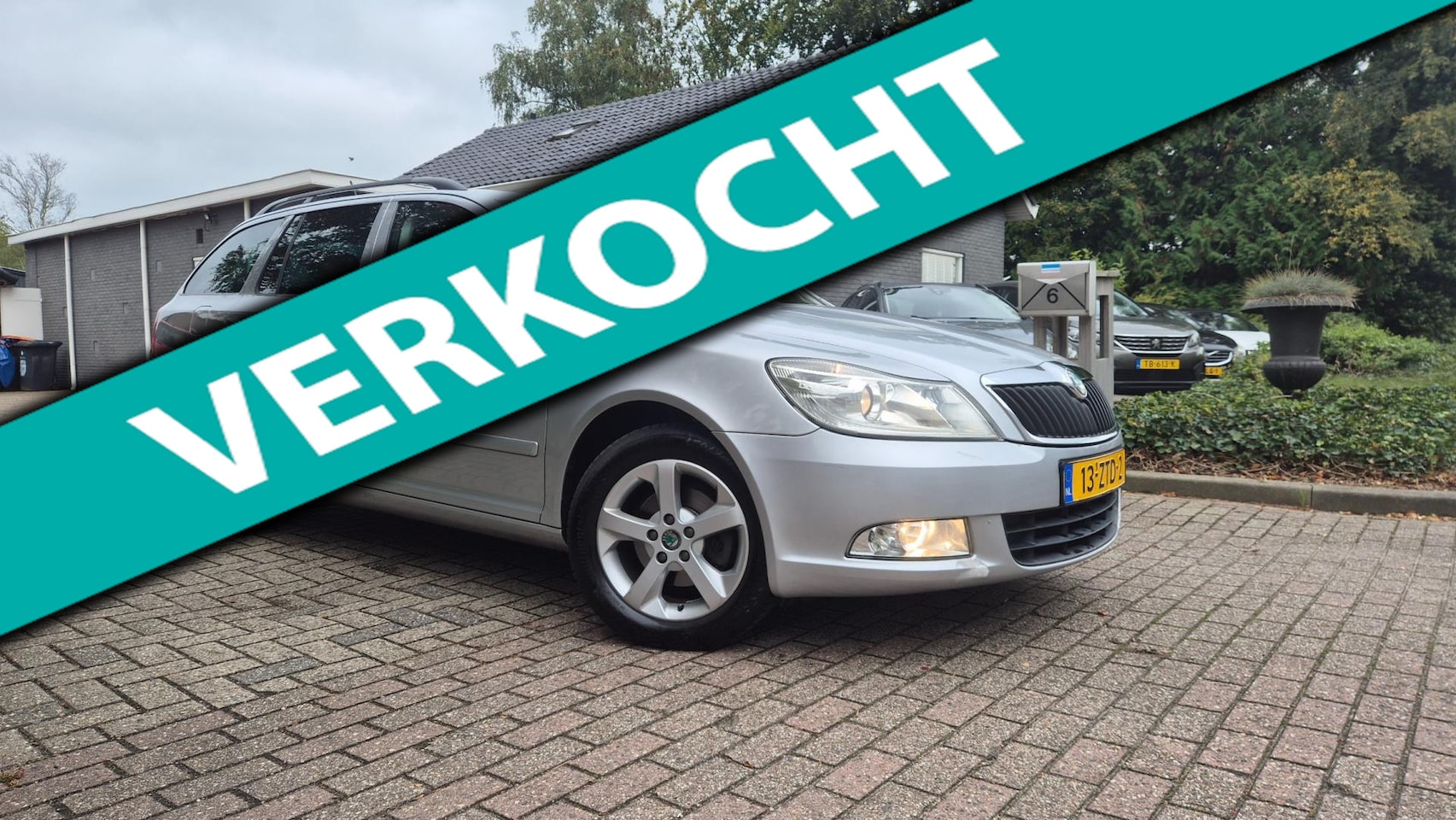 Skoda Octavia Combi - 1.6 TDI Greentech Arctic-CLIMA-NAVI 2013 - AutoWereld.nl