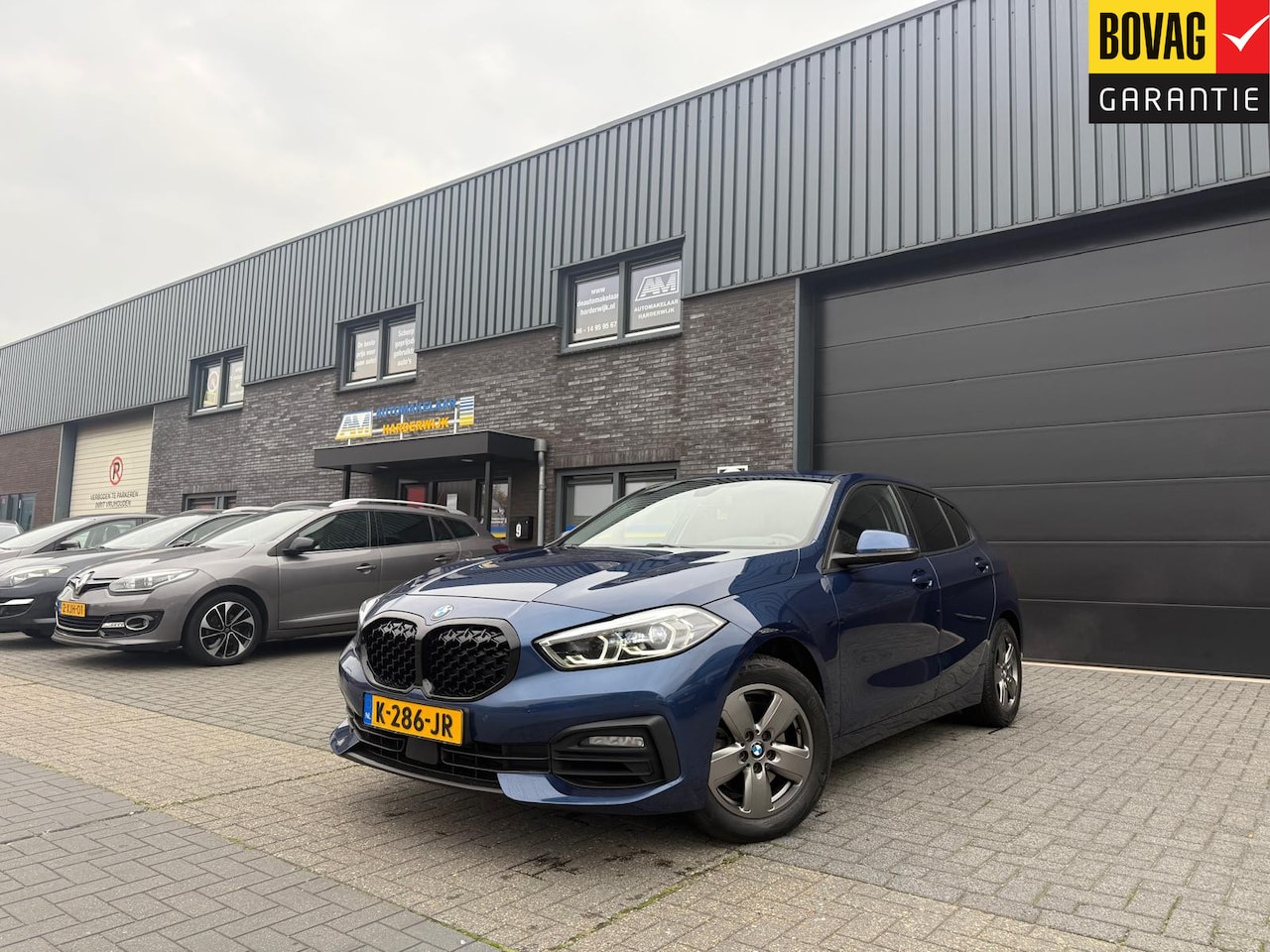 BMW 1-serie - 116i Executive Edition | 1E EIGENAAR | 12MND GARANTIE | AUTOMAAT | DAB | NAVI | LED | CARP - AutoWereld.nl