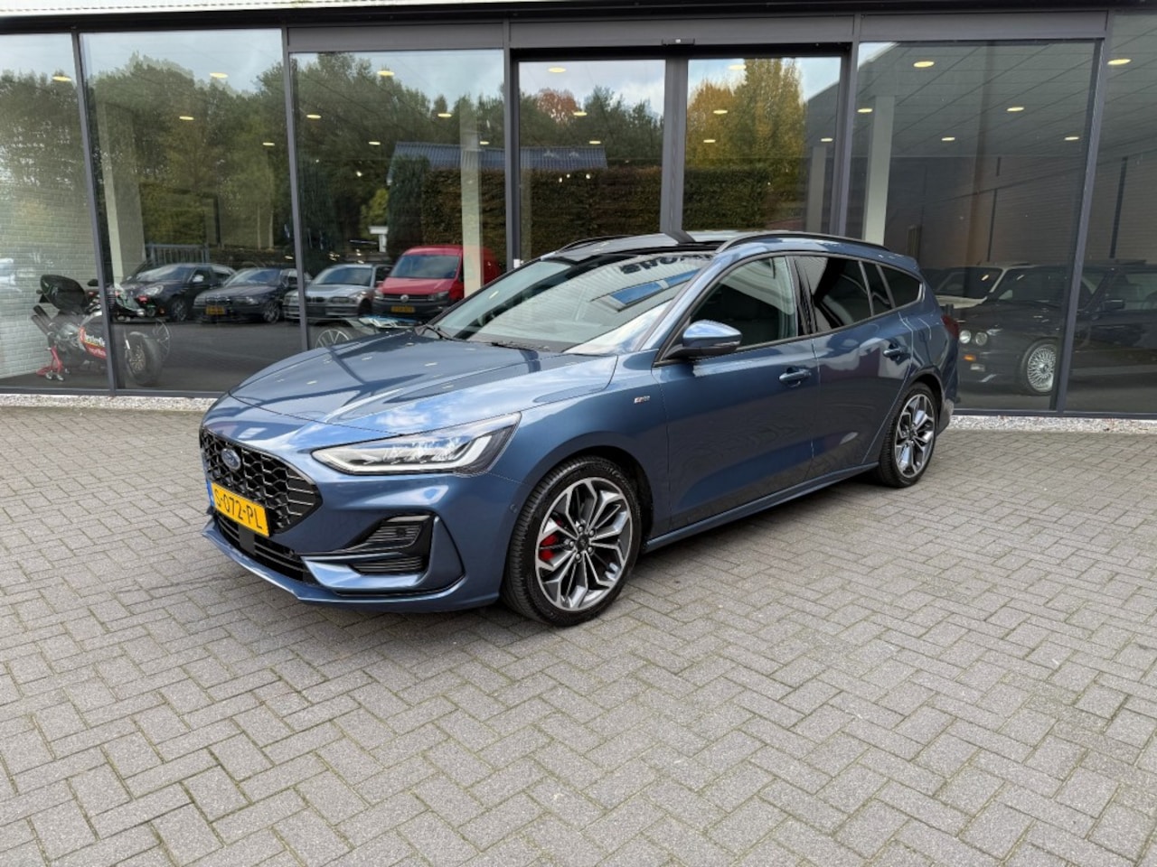 Ford Focus Wagon - Wagon 1.0 EBH ST-Line X,Pano,Gr. Navi,Digi Displ.,B/O,Camera,Stoelverw, - AutoWereld.nl