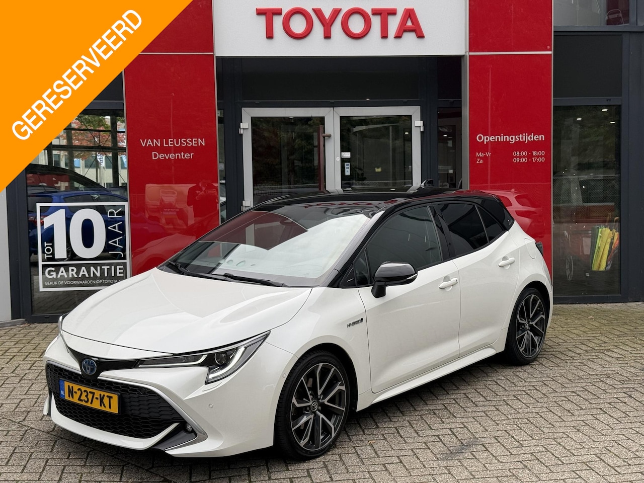 Toyota Corolla - 2.0 Hybrid Executive PRK SNSR V+A STOEL/STUUR VERWARMING CAMERA LM - AutoWereld.nl
