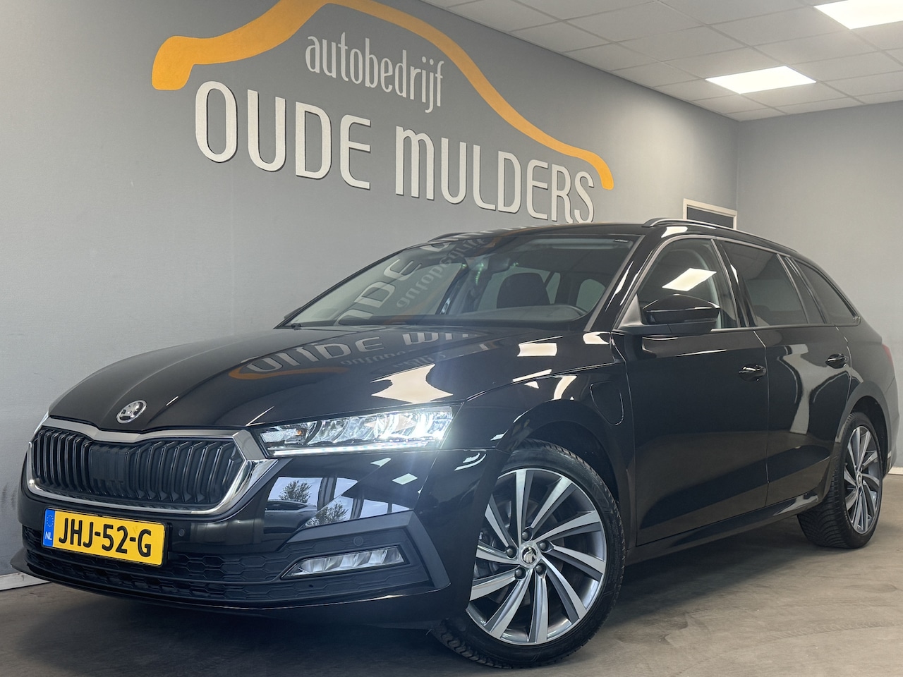 Skoda Octavia Combi - 1.4 Stoelverwarming/Parkeersensoren/Trekhaak - AutoWereld.nl