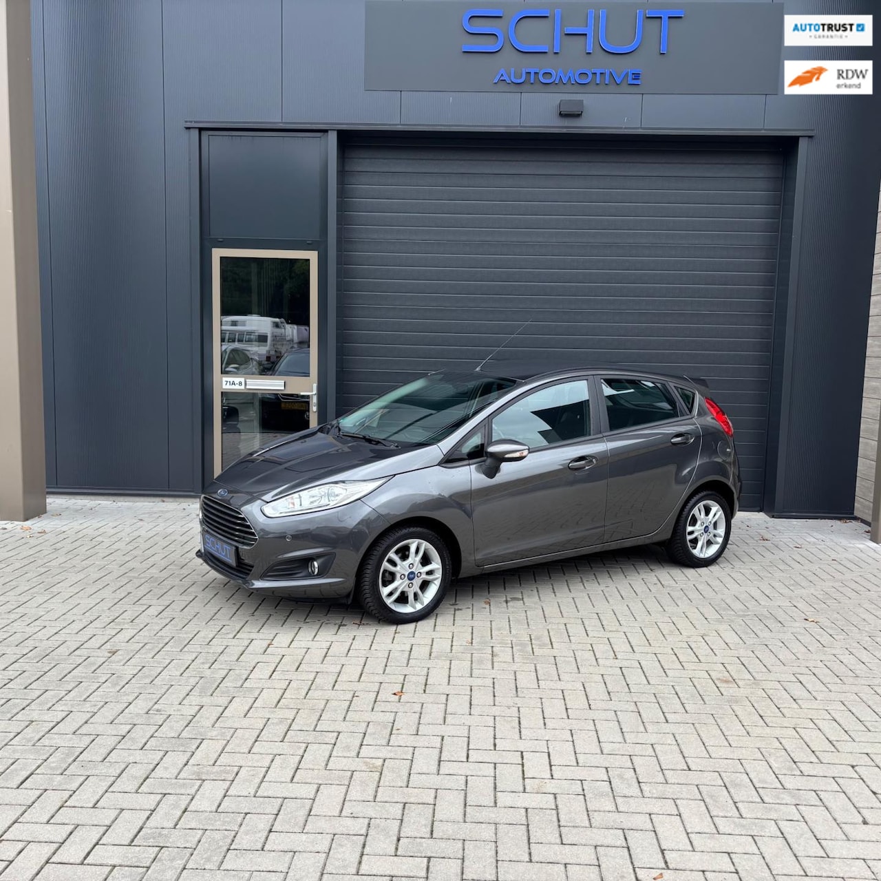 Ford Fiesta - 100pk Titanium AIRCO | PDC | STOELVERWARMING | LAGE KM-STAND - AutoWereld.nl