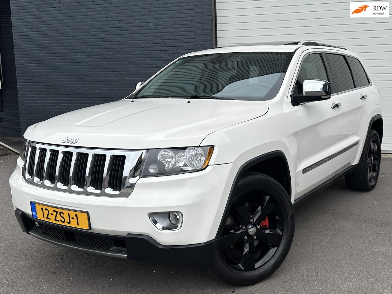 Jeep Grand Cherokee - 3.6 Overland Summit SCHUIFDAK/LEDER/STOEL-STUURVERWARMING - AutoWereld.nl