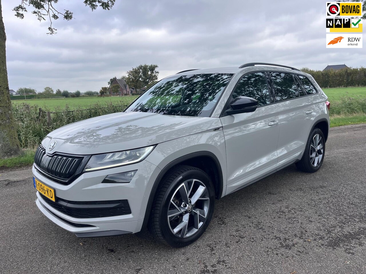 Skoda Kodiaq - 1.5 TSI Sportline Business 1e eig , trekhaak - AutoWereld.nl