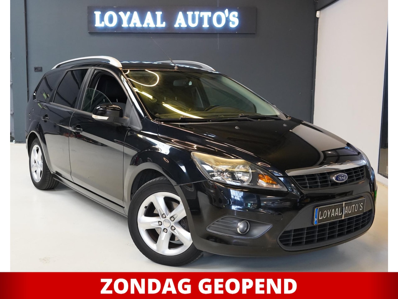 Ford Focus Wagon - 1.6 Comfort | NAVI | CRUISE | AIRCO | TREKHAAK | NAP | APK. - AutoWereld.nl