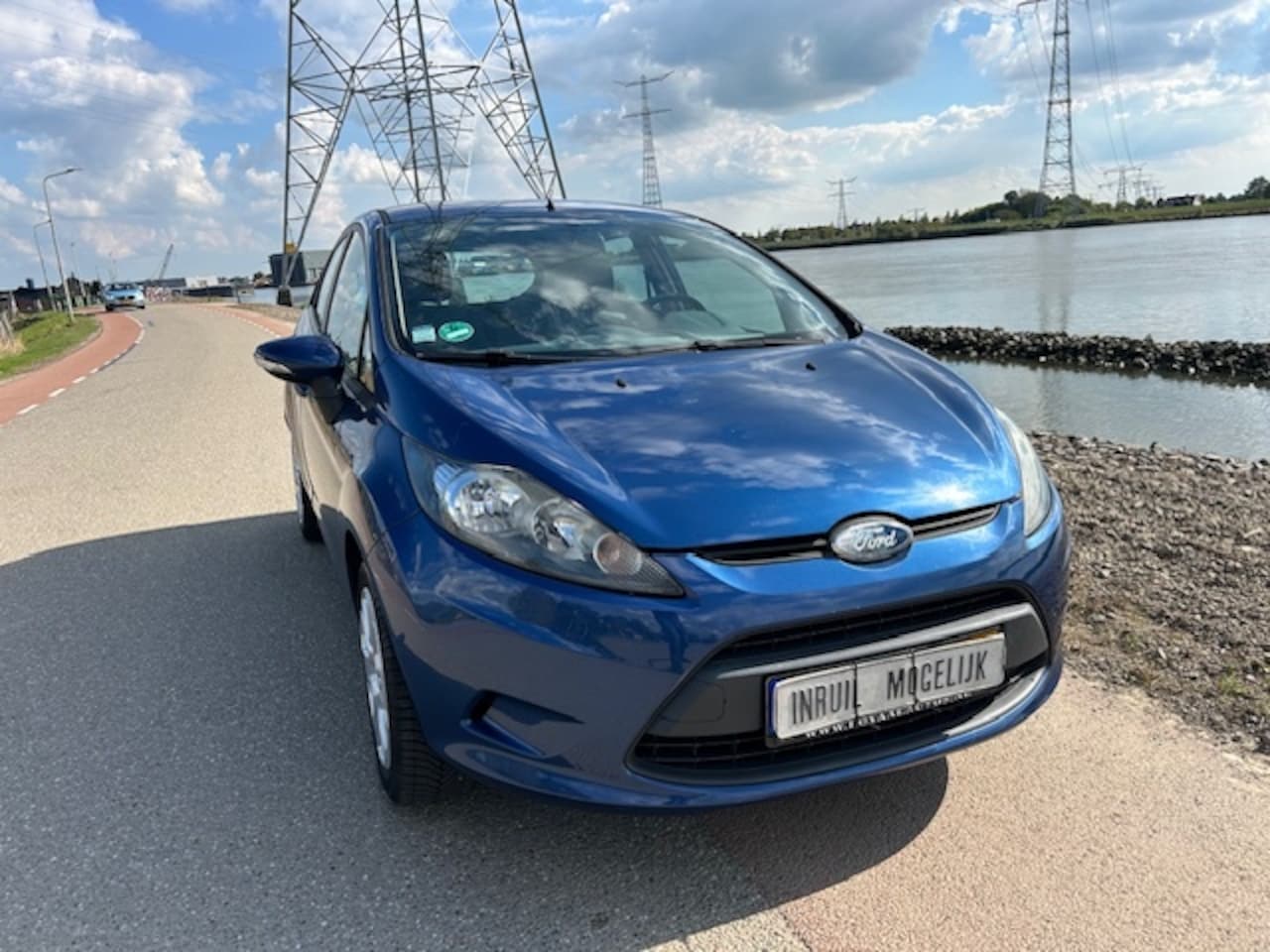 Ford Fiesta - 1.25 16v 5 deurs Michelin All Season banden keurige auto - AutoWereld.nl