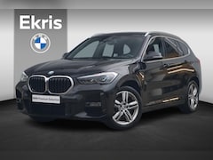 BMW X1 - sDrive20i M Sport | Harman Kardon / Elektrische stoelen met Memory / Stoel & Stuurwielverw