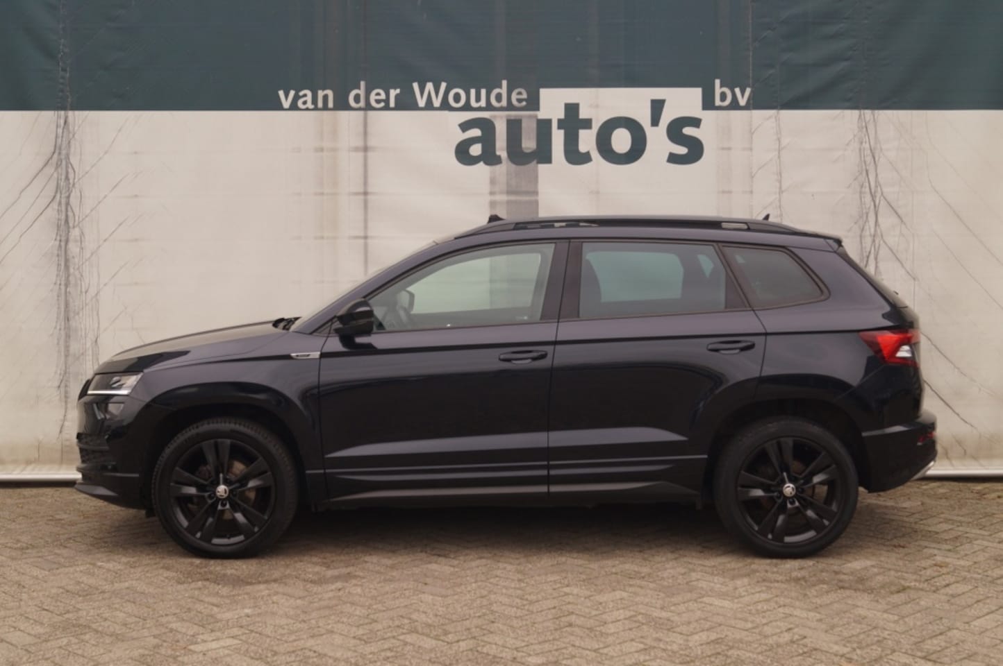 Skoda Karoq - 1.5 TSI 150pk Sportline Business -PANO-ECC-LED-NAVI- - AutoWereld.nl
