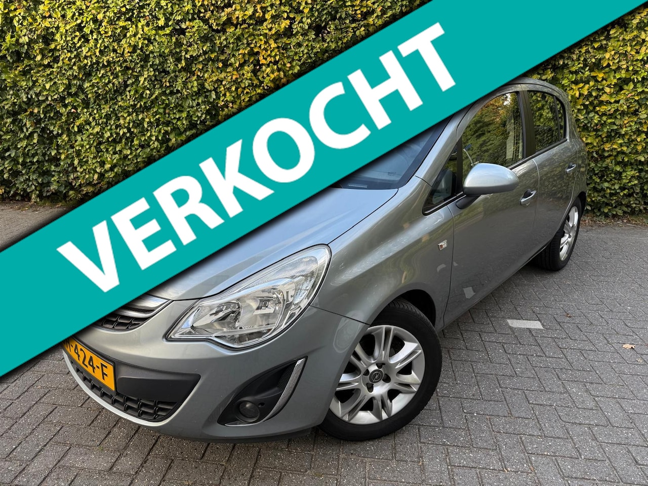 Opel Corsa - 1.4i 16V Cosmo I Automaat I Airco - AutoWereld.nl