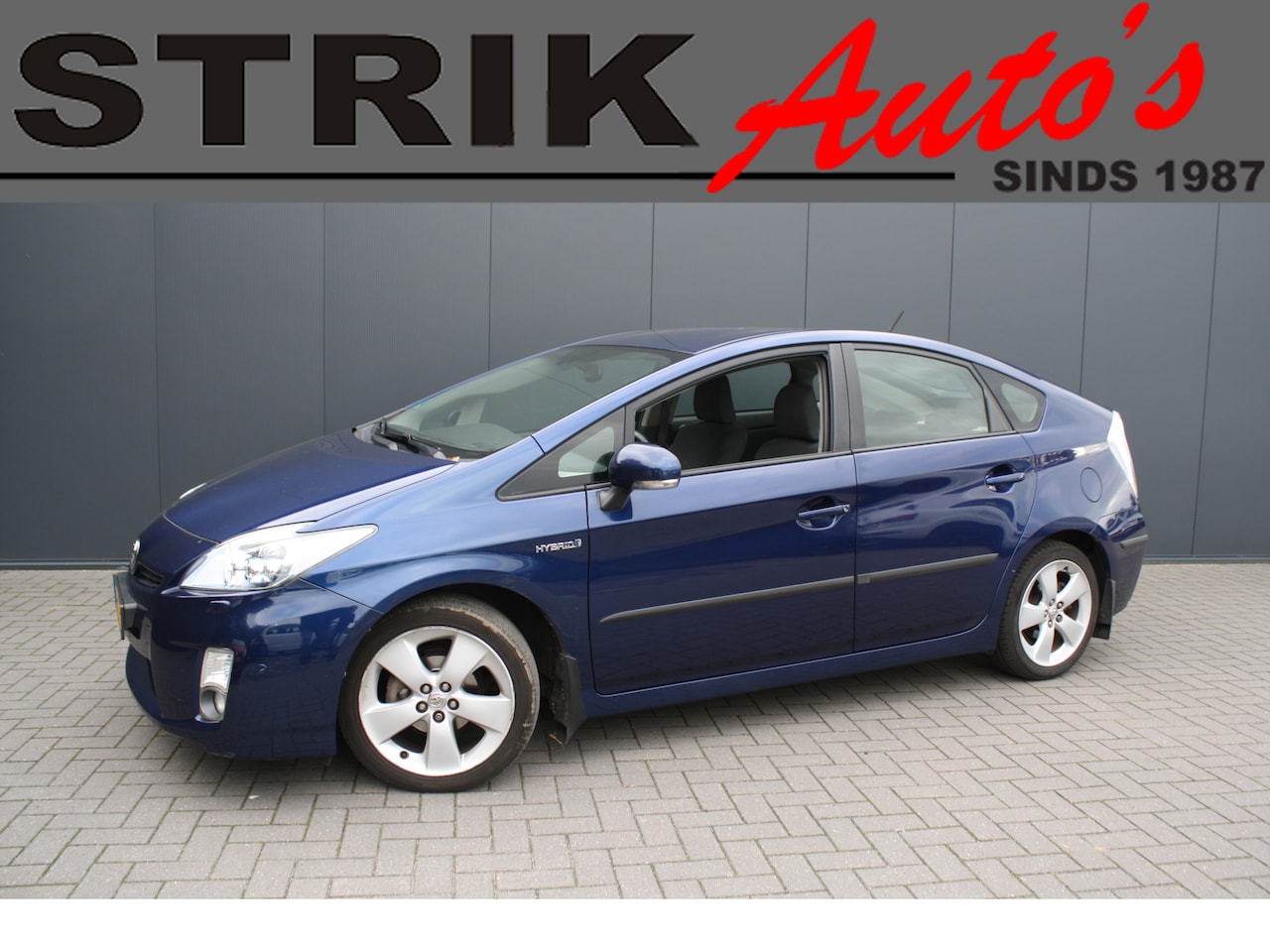 Toyota Prius - 1.8 Dynamic - 1e EIGENAAR - NAVIGATIE - CAMERA - TREKHAAK - AutoWereld.nl