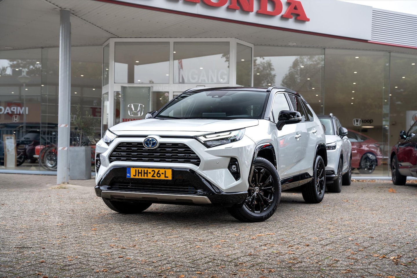 Toyota RAV4 - 2.5 Hybrid AWD Style Automaat | Bi-Tone | Adaptieve Cruise Control | PDC voor en achter | - AutoWereld.nl