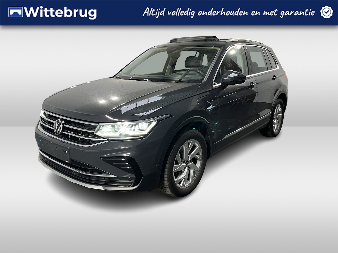 Volkswagen Tiguan - 1.4 TSI eHybrid Elegance / AUTOMAAT/ 245PK/ PANO/ HEAD-UP DISPLAY/ ELEKTR. STOEL/ LEDER/ P - AutoWereld.nl