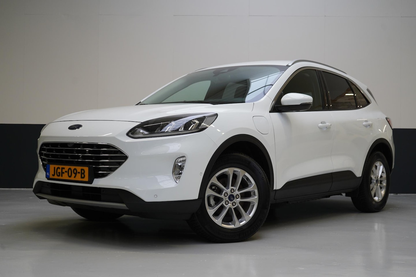 Ford Kuga - 2.5 PHEV Titanium | Adapt. Cruise | Voorruitverwarming | Privacy Glass | Navigatie | Clima - AutoWereld.nl