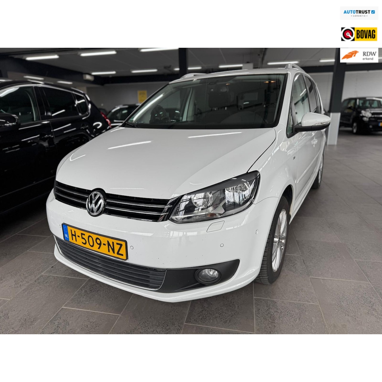 Volkswagen Touran - 1.2 TSI Highline BlueMotion 7p. Navi Clima cruise lm-velgen elekt-pakket parkeersensoren s - AutoWereld.nl