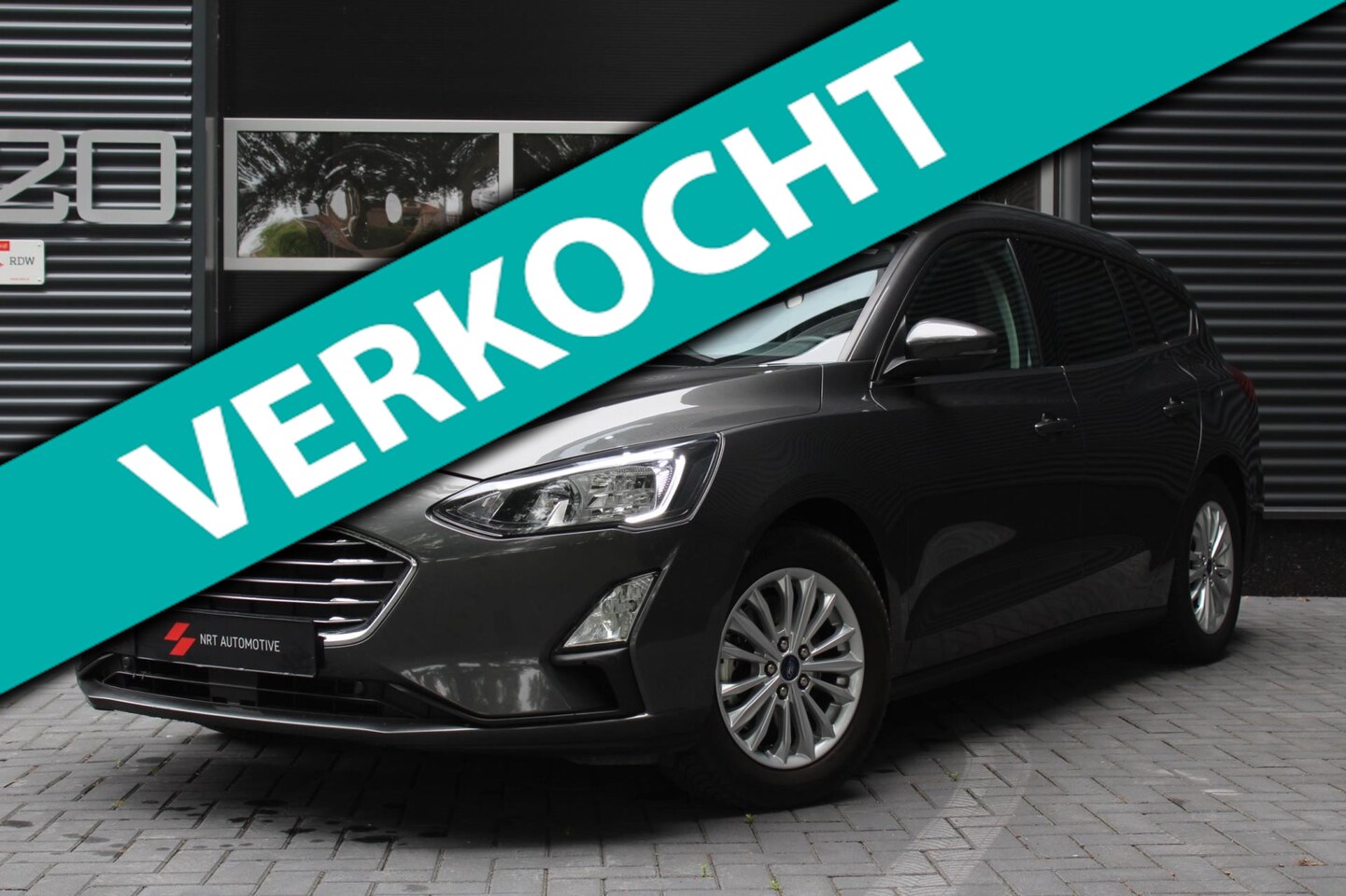 Ford Focus - 1.0 Titanium Business / PDC / Cruise / Keyless / Clima / Carplay / NIEUWE DISTRIBUTIERIEM - AutoWereld.nl