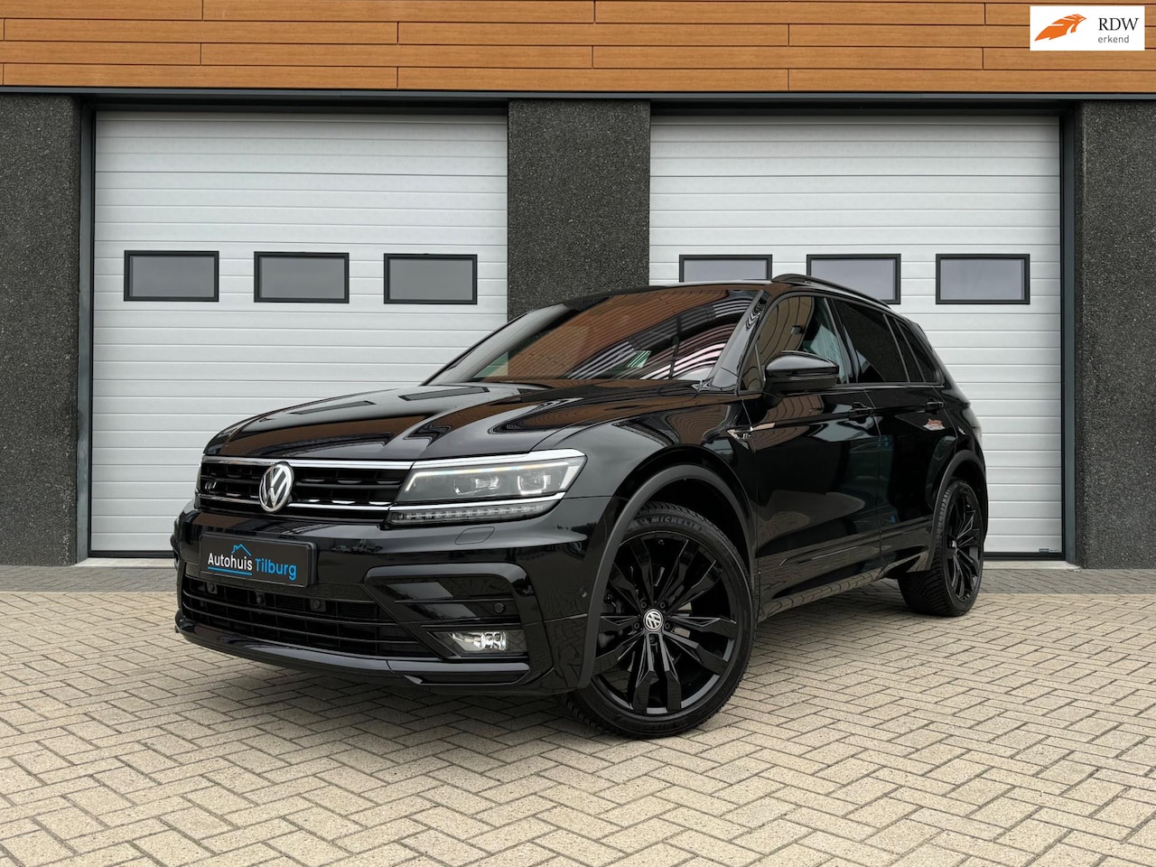 Volkswagen Tiguan - 2.0 TSI 4Motion 3x R-Line Pano Trekhaak Leder Vol - AutoWereld.nl