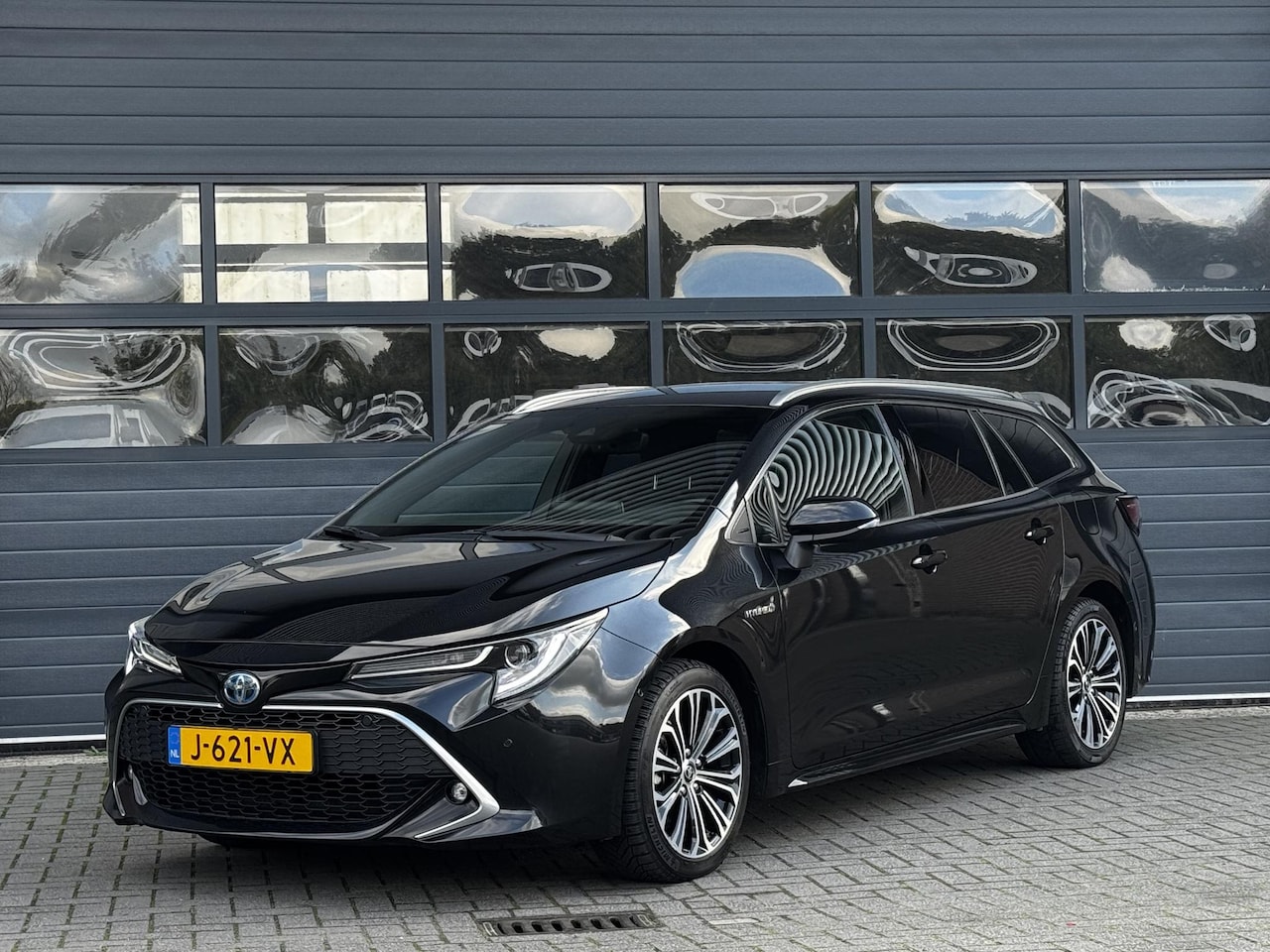 Toyota Corolla Touring Sports - 1.8 HYBRID EXECUTIVE I AUTOMAAT I ADAPT. CRUISE CONTROL I ALCANTARA I APPLE CARPLAY - AutoWereld.nl