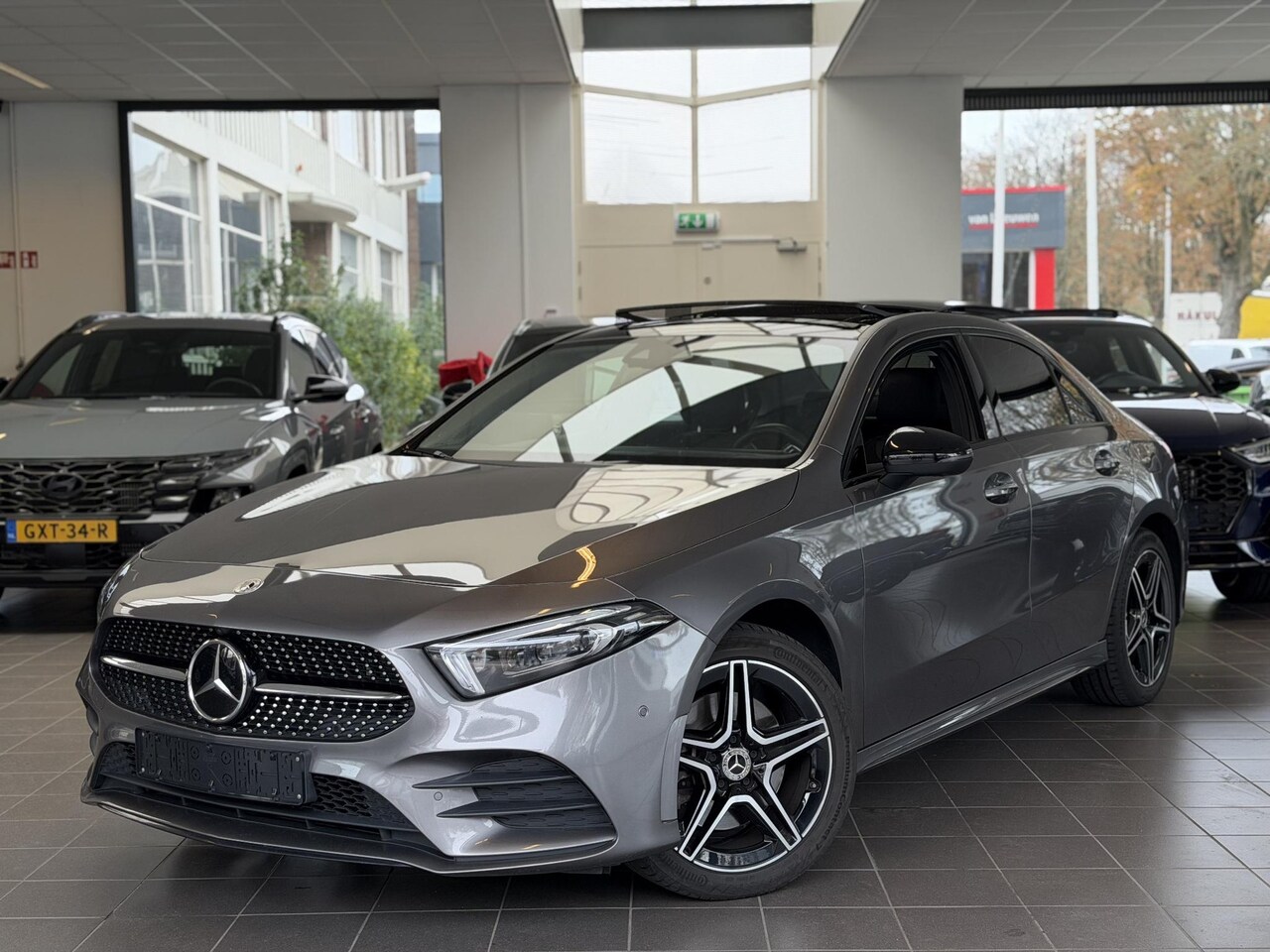 Mercedes-Benz A-klasse - 250 e AMG Line PANO / MEMO / SFEER / NAVI / 360 BTW - AutoWereld.nl