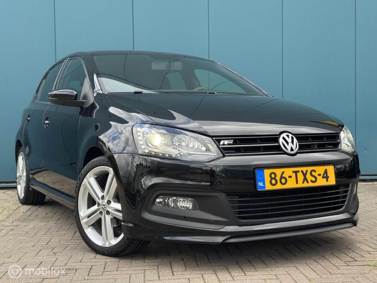 Volkswagen Polo - 1.2 TSI R-Line Highline Climate Control Cruise Control Apk 06-2026 - AutoWereld.nl
