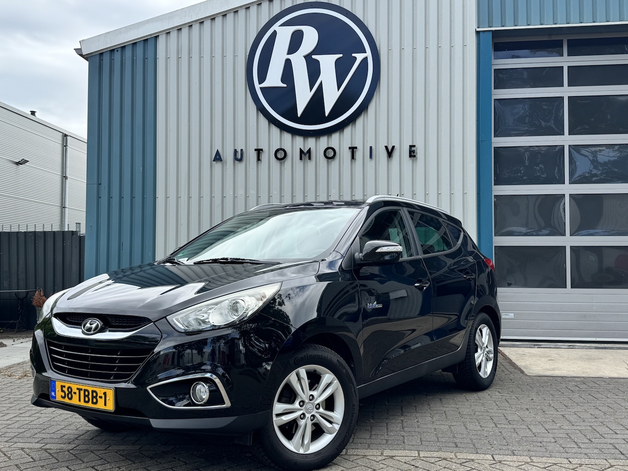 Hyundai ix35 - 1.6i GDI Leer / Navi / Camera / Stoelverw / Org NL Auto / N.A.P. - AutoWereld.nl