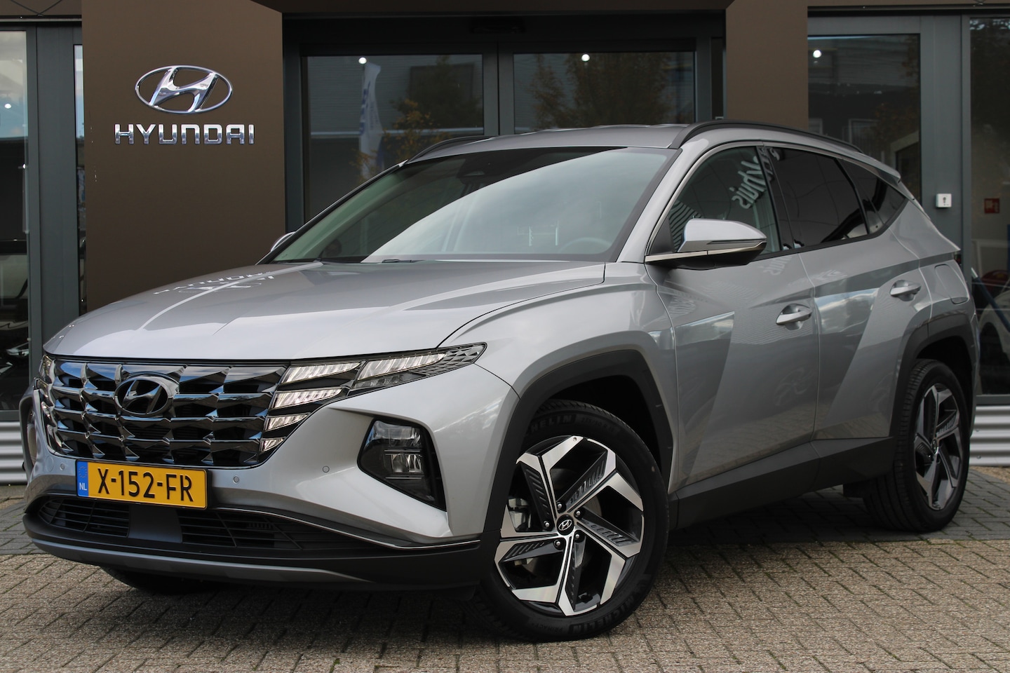 Hyundai Tucson - 1.6 T-GDI PHEV Comfort Smart 4WD | Cruise control adaptief met Stop&Go | Stuurwiel verwarm - AutoWereld.nl