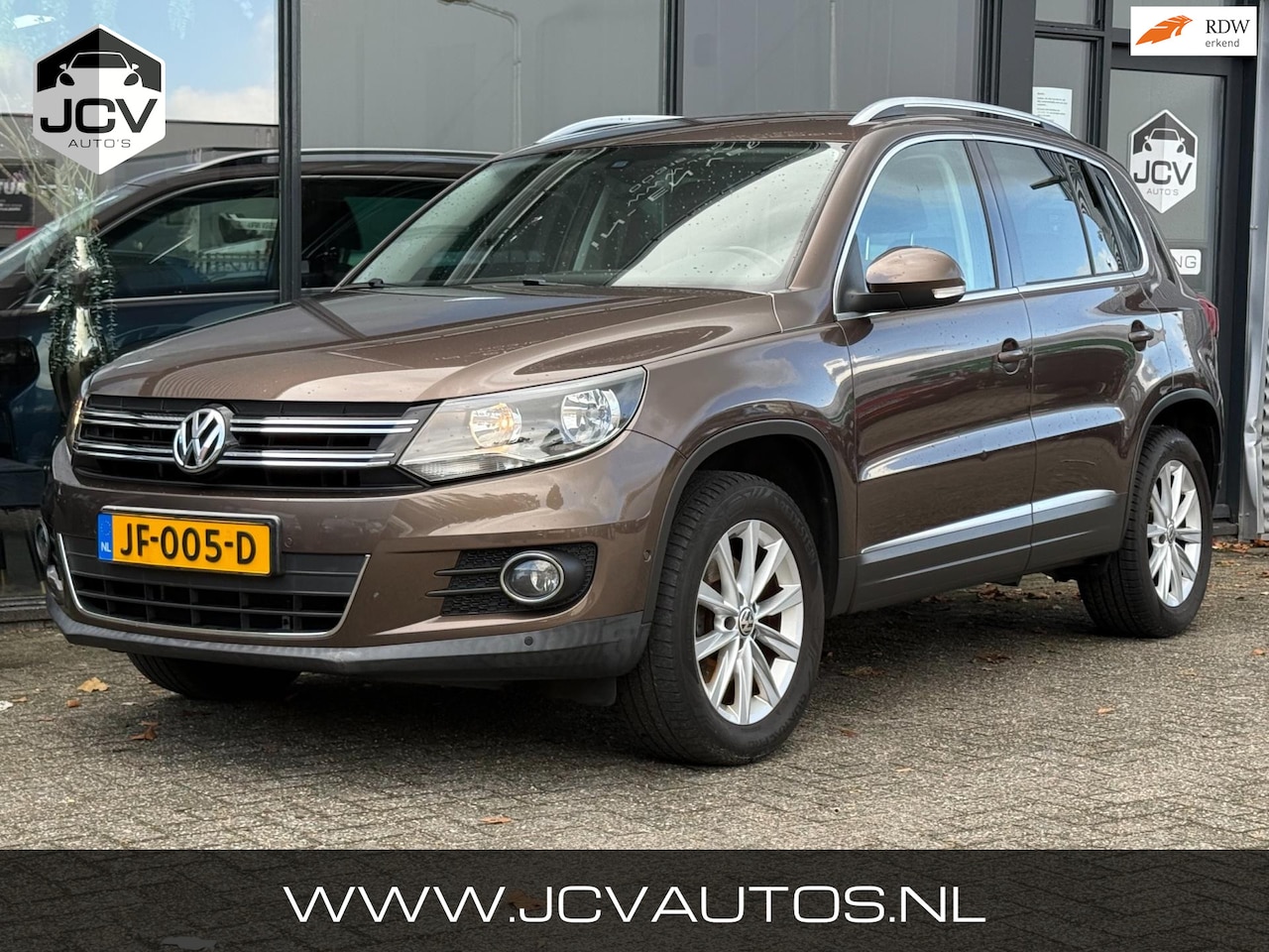 Volkswagen Tiguan - 1.4 TSI Sport&Style NAVI/APK/AIRCO/PDC - AutoWereld.nl