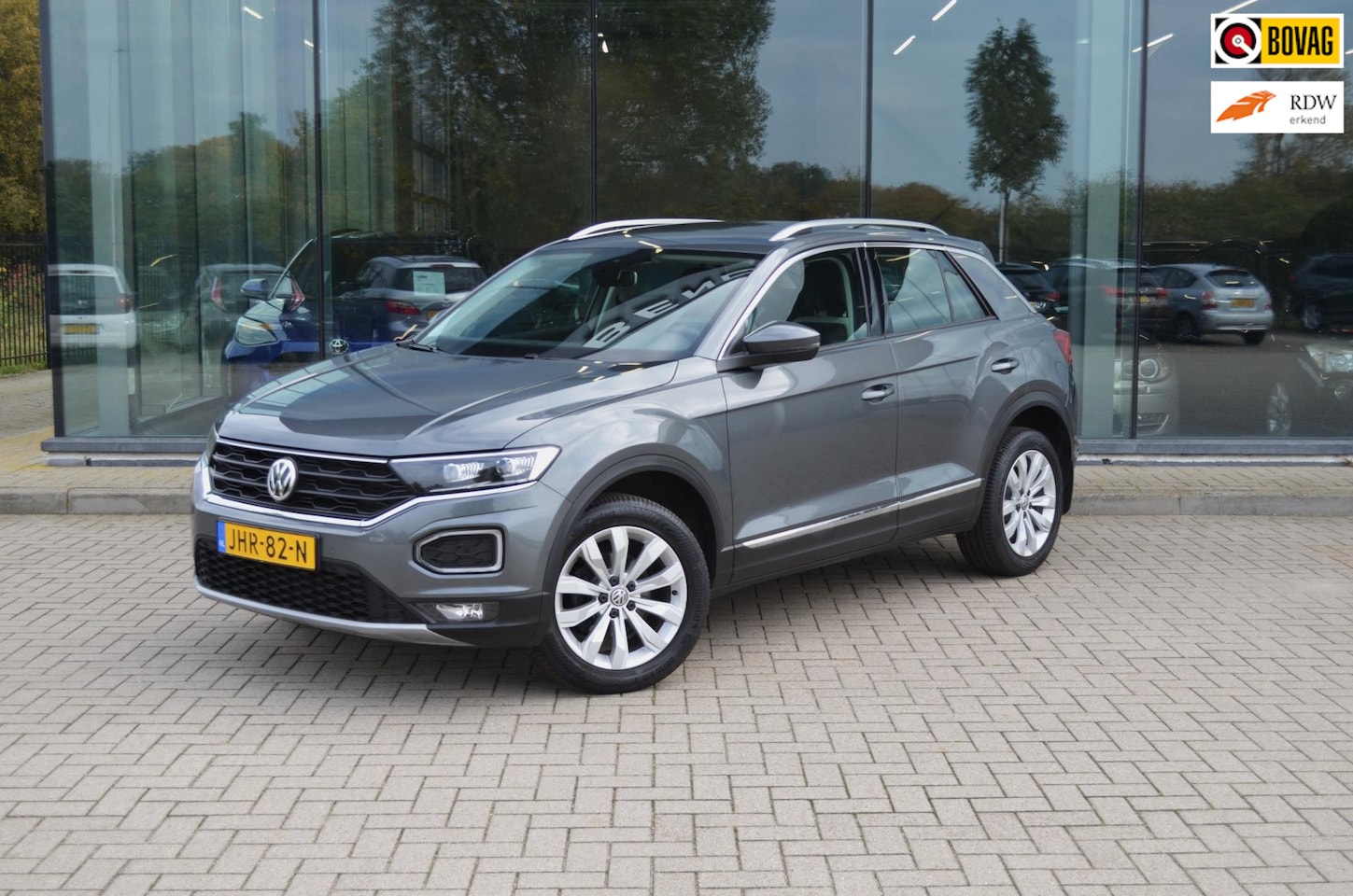 Volkswagen T-Roc - 1.5 TSI Sport | Trekhaak | Elektrische kofferbak | Stoelverwarming | Inklapbare spiegels - AutoWereld.nl