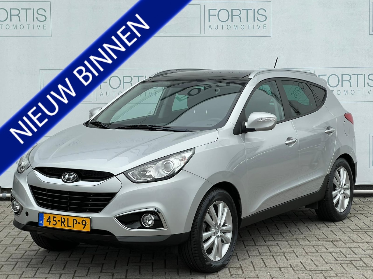 Hyundai ix35 - 2.0i 4WD i-Catcher PANDODAK | ECC | LEDER - AutoWereld.nl