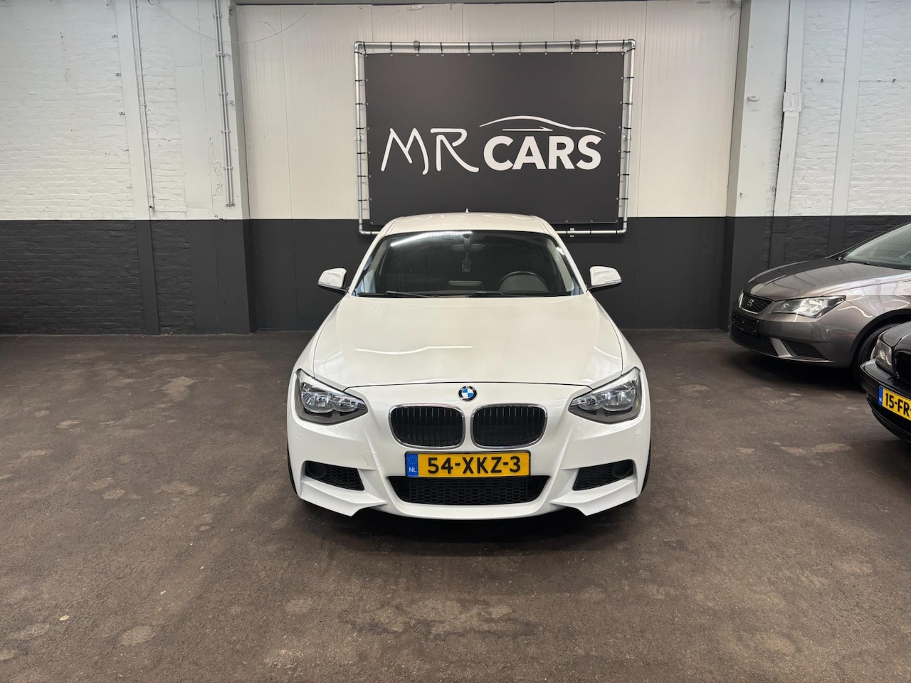 BMW 1-serie - 116i Business M sport navi/clima - AutoWereld.nl