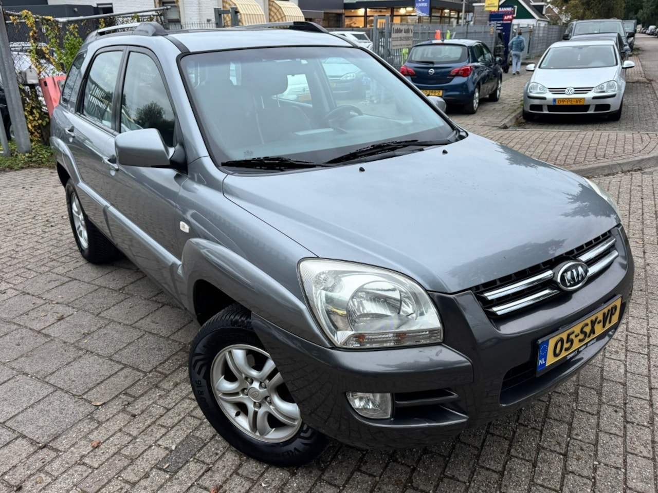 Kia Sportage - 2.0 CVVT Executive 2.0 CVVT Executive - AutoWereld.nl
