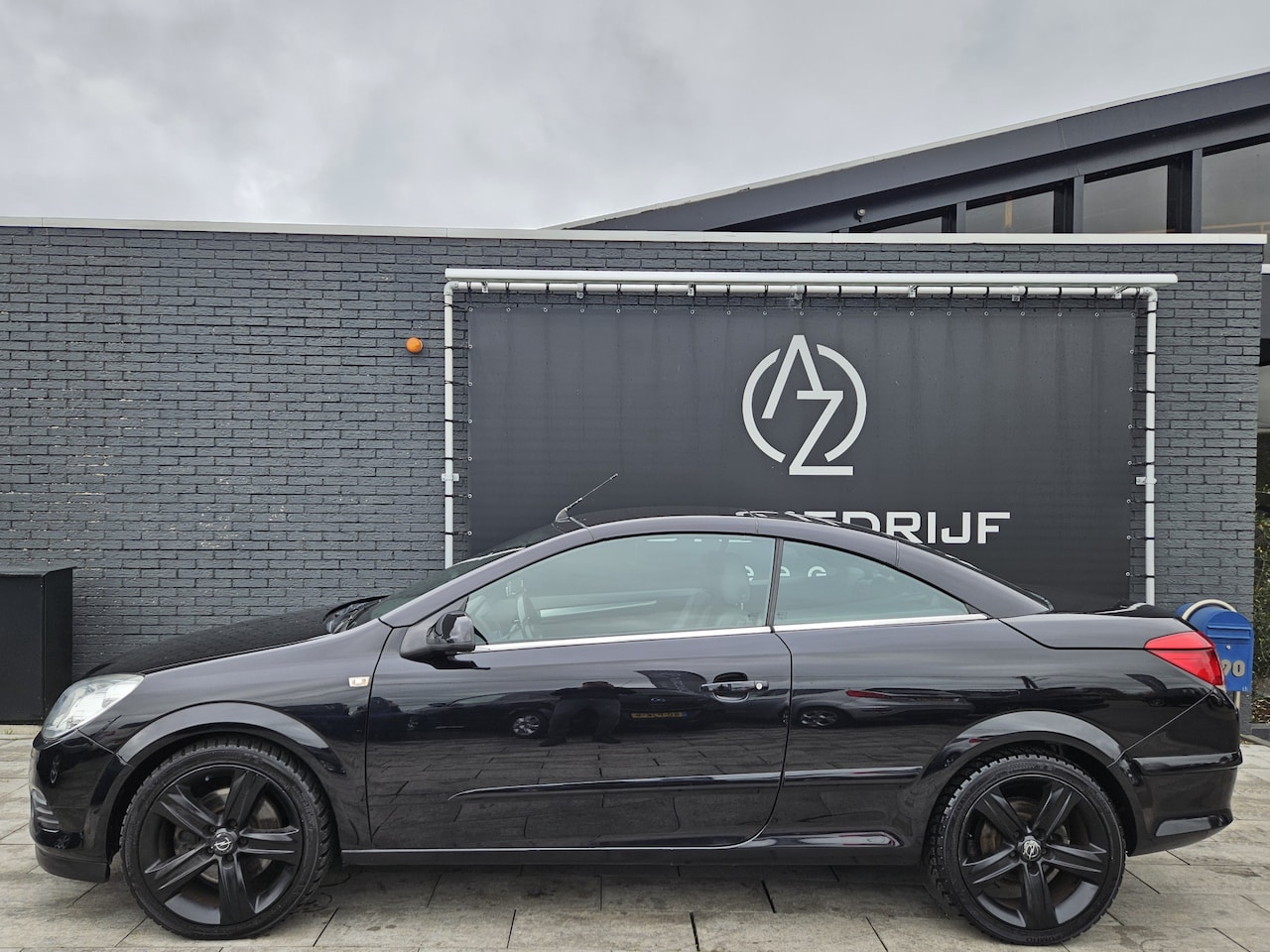 Opel Astra TwinTop - 1.9 CDTi Cosmo *Diesel*Cabrio - AutoWereld.nl