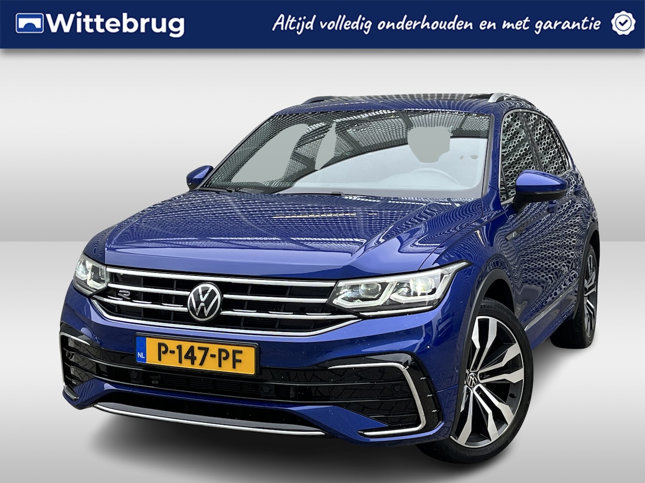 Volkswagen Tiguan - 1.5 TSI R-Line Business+ / Pano / Digitaal dashboard / Navigatie / App connect / Camera / - AutoWereld.nl