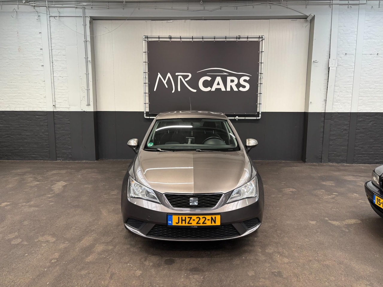 SEAT Ibiza - 1.4 clima/navi - AutoWereld.nl