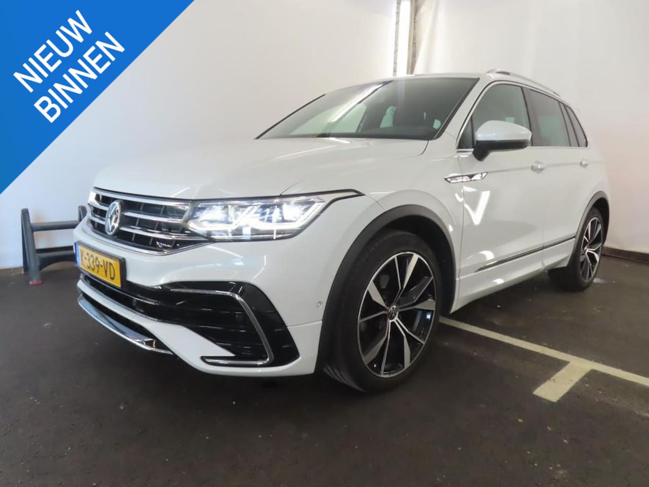 Volkswagen Tiguan - 1.5 TSI R-LINE BUSINESS+ I AUTOMAAT I TREKHAAK I STOELVERWARMING I CLIMATE CONTROL - AutoWereld.nl