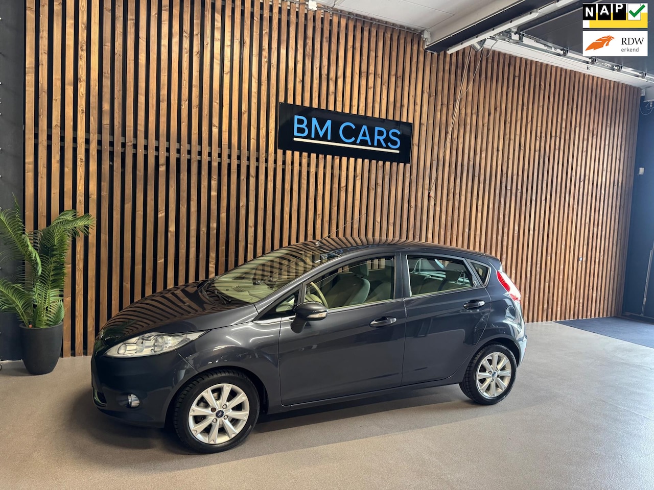 Ford Fiesta - 1.25 Ghia Clima, Cruise, Parksensor - AutoWereld.nl