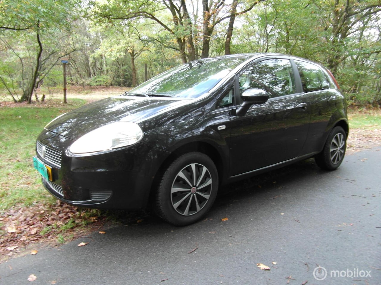Fiat Grande Punto - 1.4 Active bouwjaar 2009 nieuwe apk - AutoWereld.nl