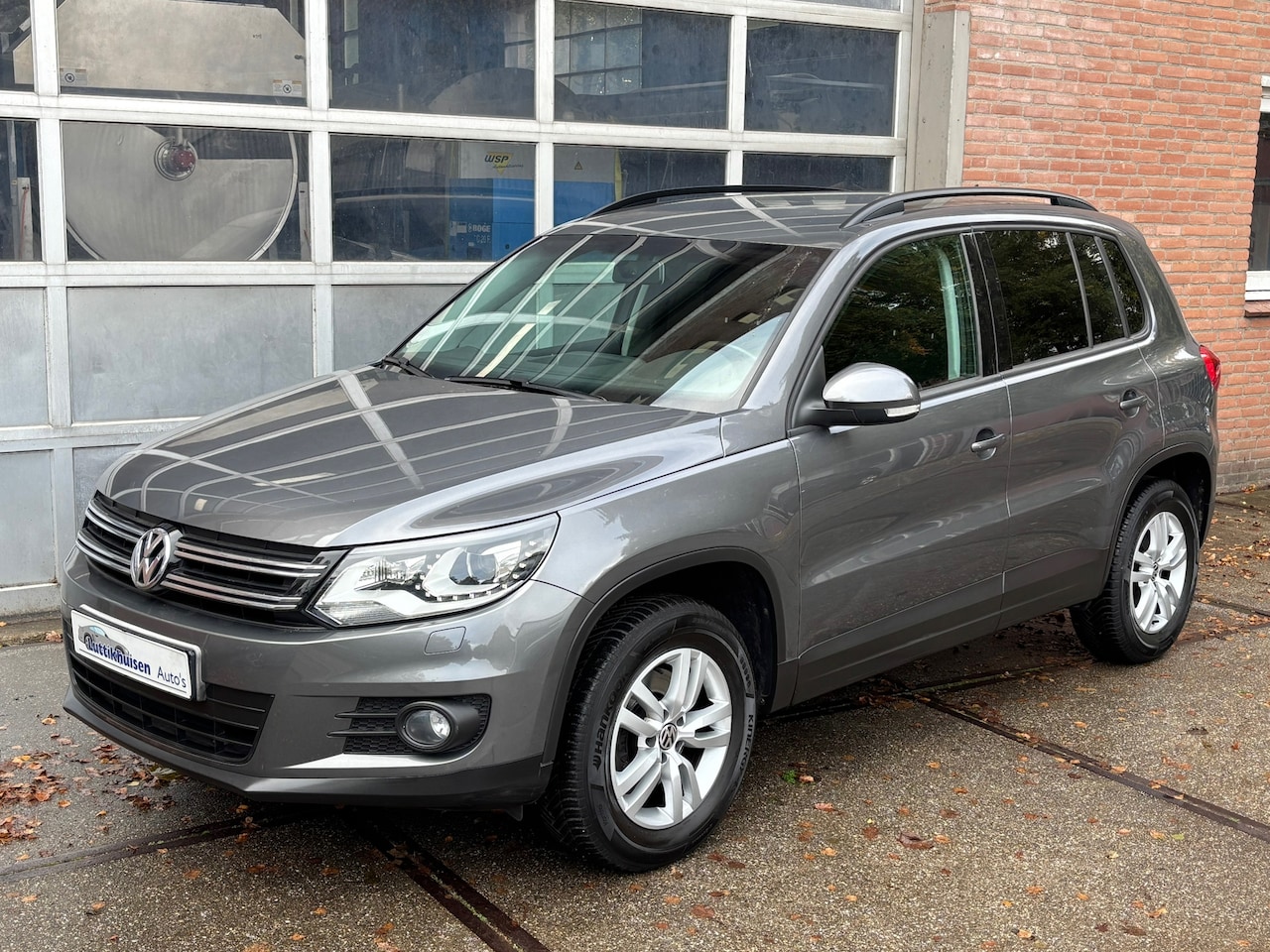 Volkswagen Tiguan - 2.0 TSI Sport&Style 4Motion,AUTOMAAT,XENON,STOEL VERW,LMV,109852 km - AutoWereld.nl