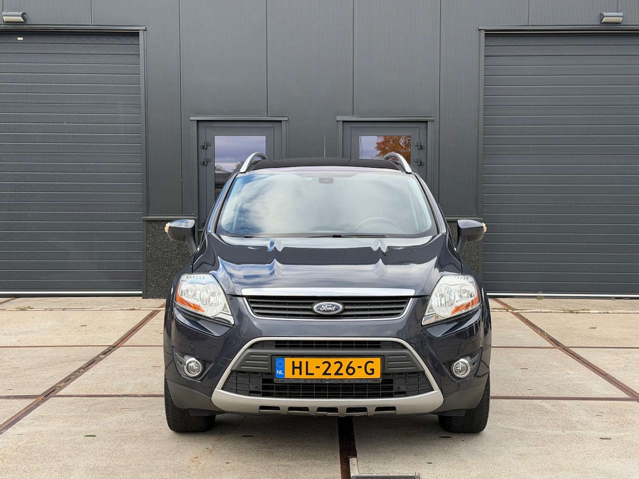 Ford Kuga - 2.0 TDCi Titanium Navi Clima Cruis Panoramadak Keyless - AutoWereld.nl