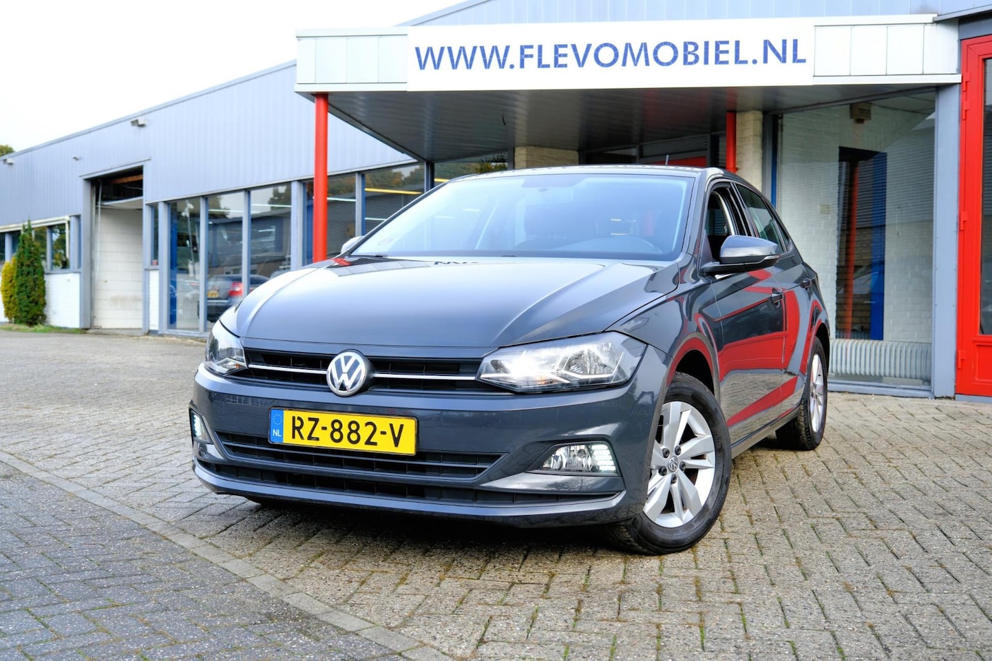 Volkswagen Polo - 1.0 TSI Comfortline *59.400km!* Airco|Adapt-Cruise|LMV - AutoWereld.nl