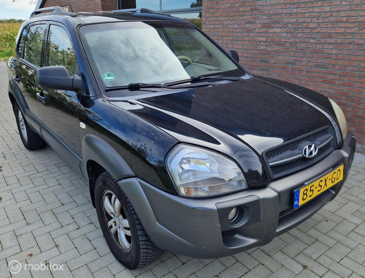 Hyundai Tucson - 2.0i Style 2.0i Style - AutoWereld.nl