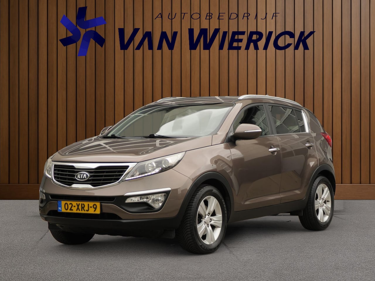 Kia Sportage - 1.6 GDI X-ecutive Plus Pack 135PK | Cruise | Half leer/stof | Camera | Bluetooth | - AutoWereld.nl